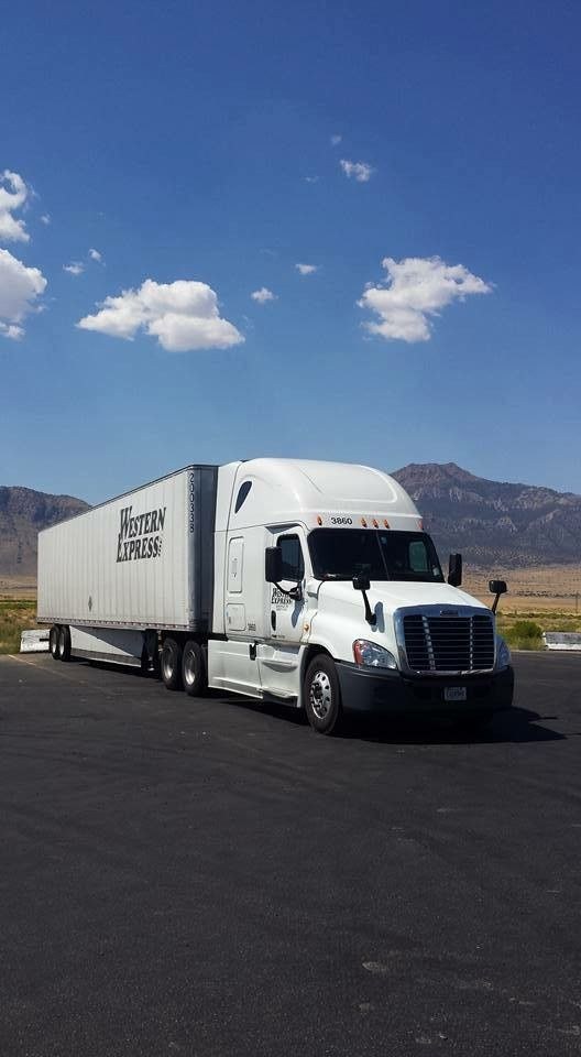 Long-haul moving semi-truck at a scenic western rest stop